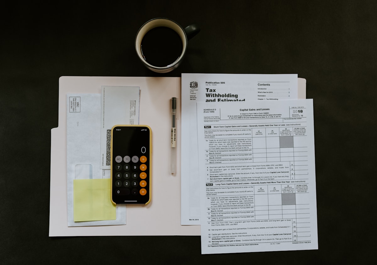 Manually preparing a contract at a desk