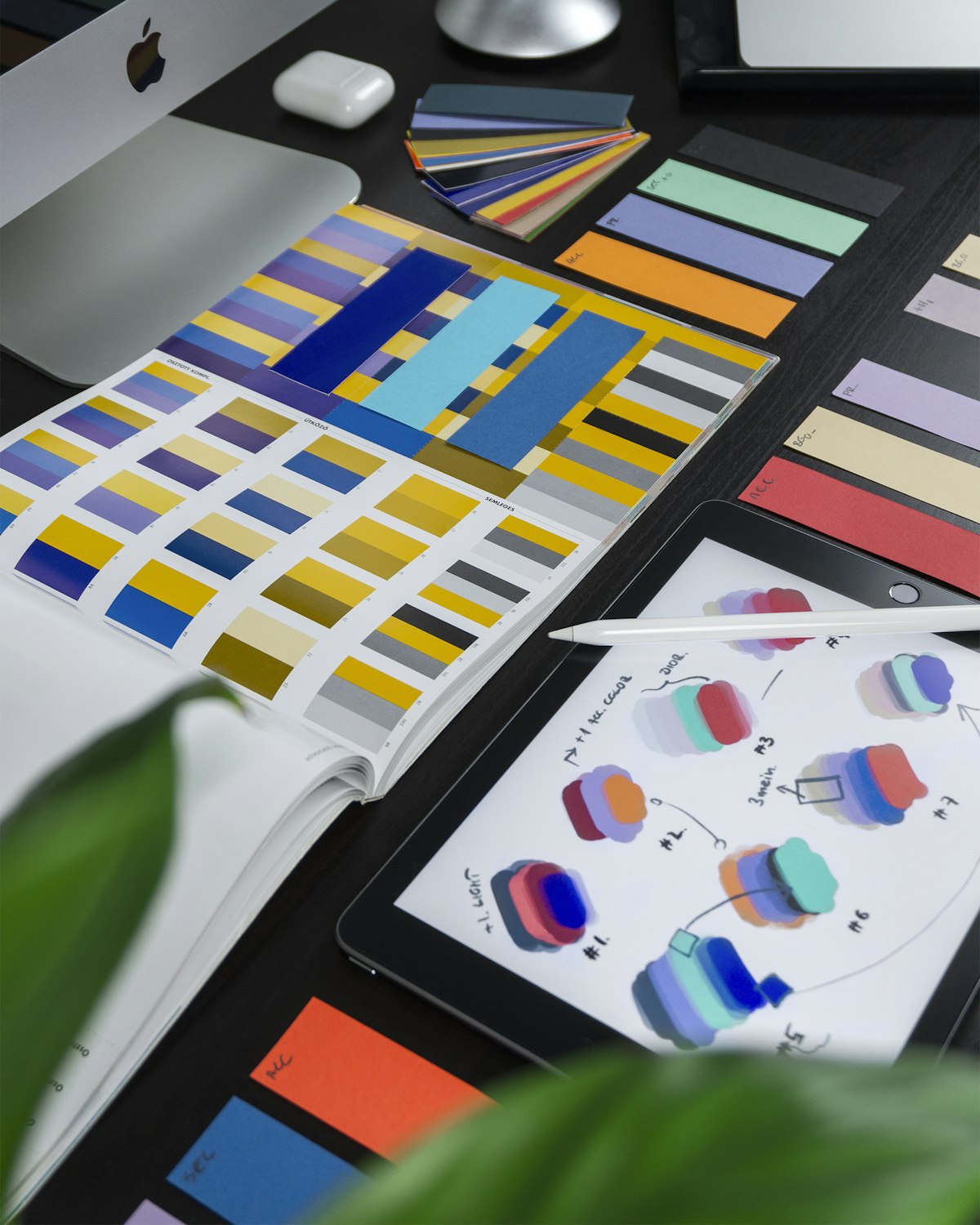 Designer editing product images on a computer
